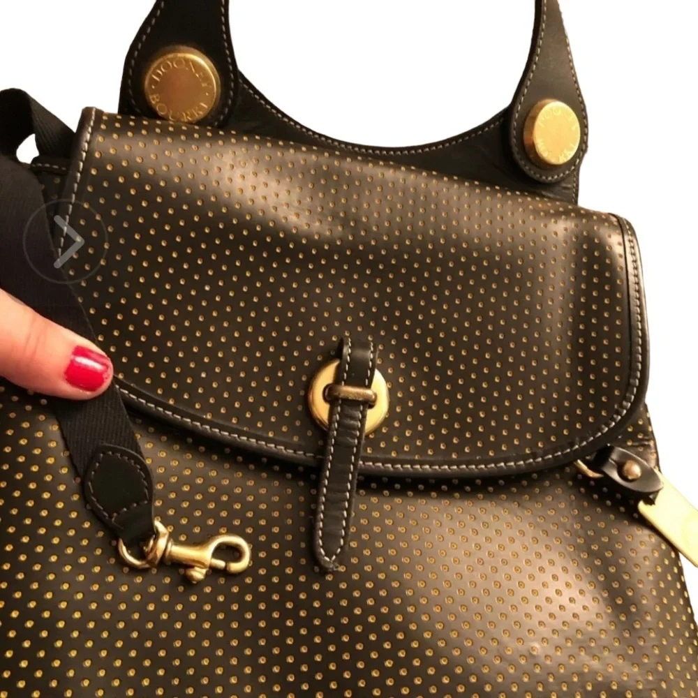 Dooney & Bourke Cabrio black leather laser cut w/ tag & serial number, vintage